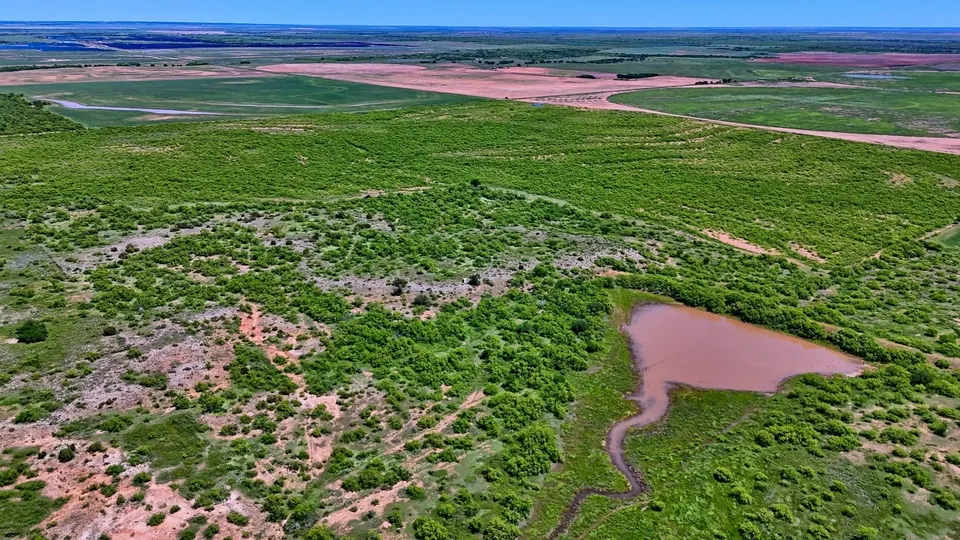 Texas land featuring a stock pond, scrub brush, and cult, 160 acres in Childress County, 160.00 acres in Childress County, TX
