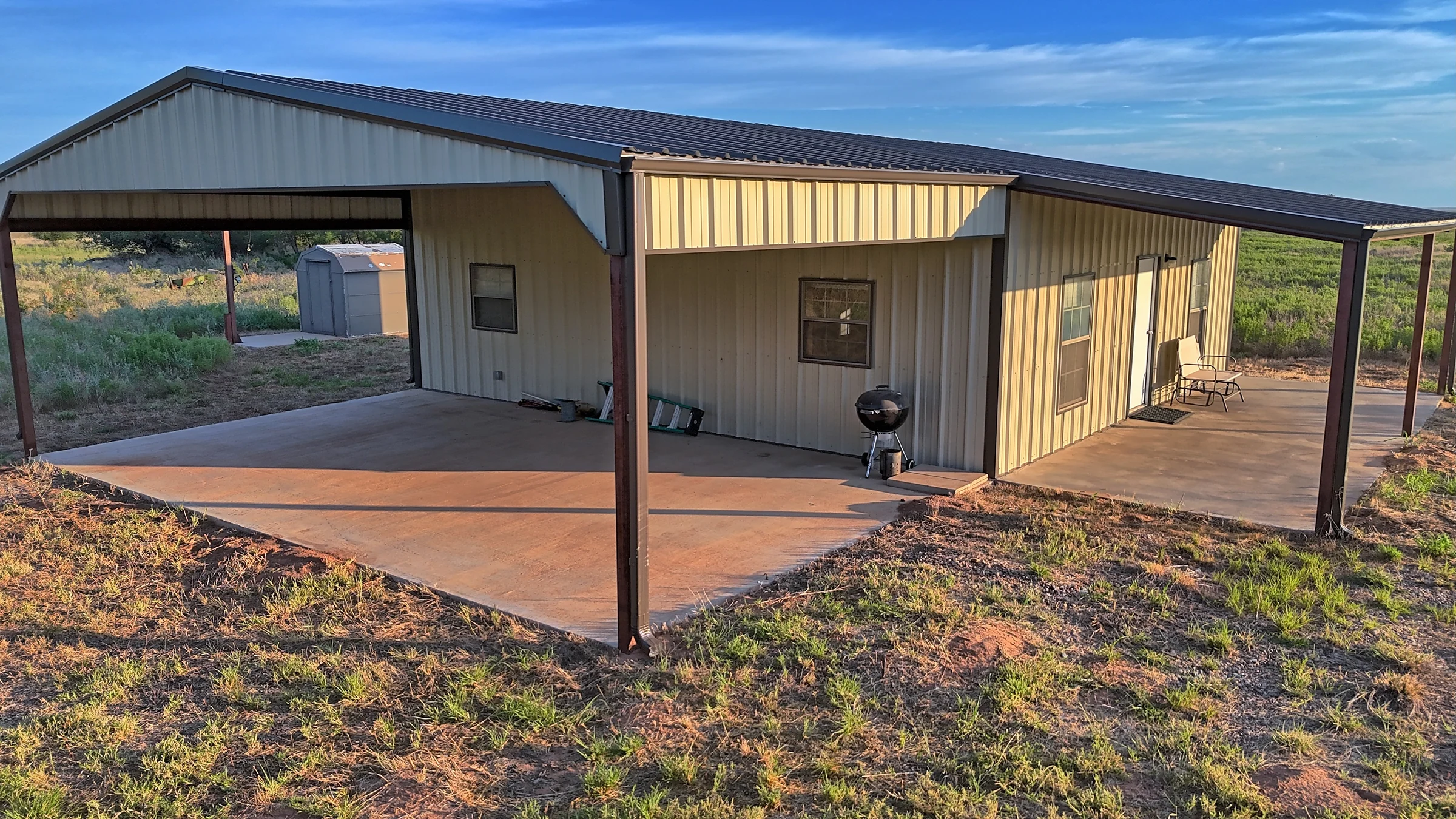 Metal ranch cabin with a covered porch