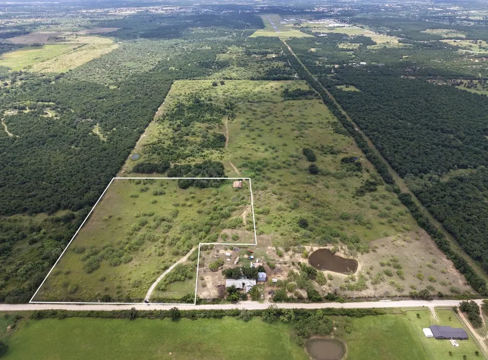 Property view on the TX ranch property showing key features and surrounding land.